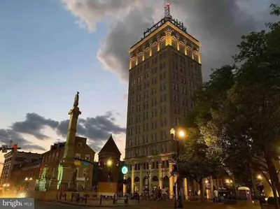 a tall building with a tower on top of it at THE ADDAMS HOUSE - LANCASTER HISTORIC DISTRICT in Lancaster