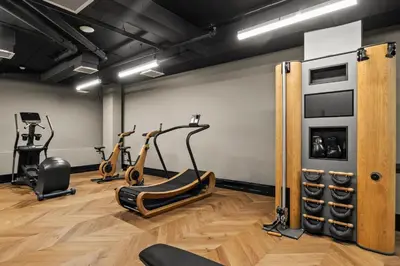 a gym with cardio machines and exercise bikes at Freeman 803 by Rove Travel - 1BR Condo with Shared Amenities in New York