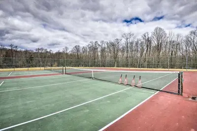 two tennis nets on a tennis court at Cottage and Suite Close to Camps and Ski Resorts in Pleasant Mount