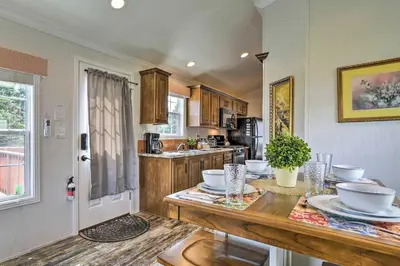 a kitchen with a table with dishes on it at Countryside Retreat Close to Ski Slopes in Pleasant Mount