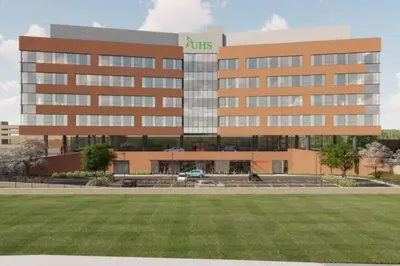 a large building with a lawn in front of it at Pleasant, Comfortable PR Near Vestal NY in Johnson City