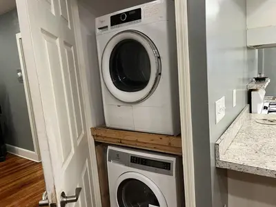 a washing machine and a dryer in a kitchen at Pleasant, Comfortable PR Near Vestal NY in Johnson City