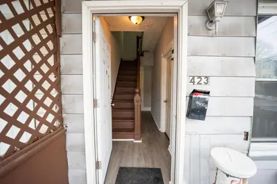a hallway of a tiny house with a staircase at Casa Ebenecer - Habitación privada # 1 in Elizabeth