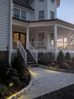 a white house with a stone walkway in front of it at Parkway House Goshen Bed And Breakfast Suite 5 in Goshen