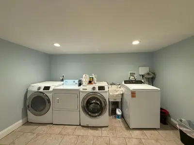 a laundry room with a washer and dryer at Super Cozy two bedrooms Apartment in University City near Drexel&UPenn in Philadelphia