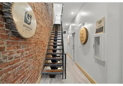 a stairway leading up to a brick wall at Temple University GSN Vine 4 in Philadelphia