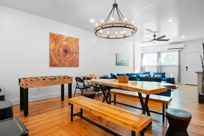 a living room with a ping pong table and a couch at Summit Stay Near Kalahari & Raceway in Pocono Summit