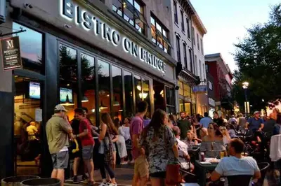 a crowd of people standing outside of a store at Modern Escape in Phoenixville, 4 Guests, Parking in Phoenixville