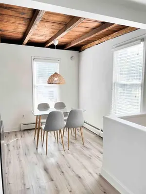 a dining room with a table and four chairs at Modern Escape in Phoenixville, 4 Guests, Parking in Phoenixville