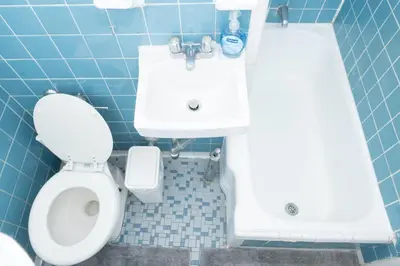 a bathroom with a toilet and a sink at Stylish2 Upper West Side Apartment 5-Min Walk to Central Park in New York