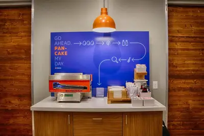 a table with a blue board with auclearuclearuclear at Holiday Inn Express Hotel & Suites Bethlehem by IHG in Bethlehem