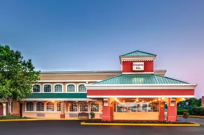 a building with a sign on the top of it at Knights Inn Mount Laurel in Mount Laurel
