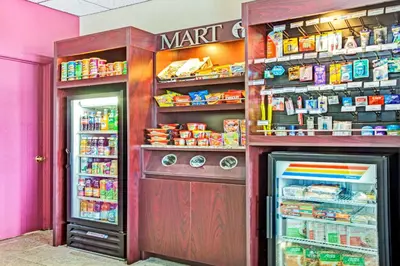 a store with a refrigerator and a pantry at Ramada by Wyndham Rockaway in Rockaway