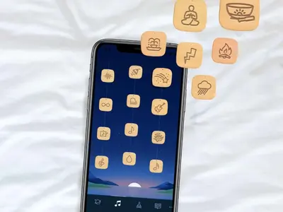an iphone laying on a bed with icons on it at Sleep Inn Cinnaminson - Philadelphia East in Cinnaminson
