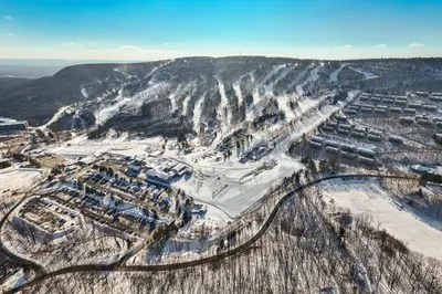 an aerial view of a city on a snowy mountain at Northridge 410 in Tannersville