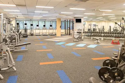 a gym with lots of equipment on the floor at Crowne Plaza Princeton - Conference Center by IHG in Princeton