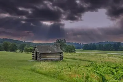 an old cabin in the middle of a field at 915CountyLineRoad Luxury Mainline Train Colleges in Bryn Mawr