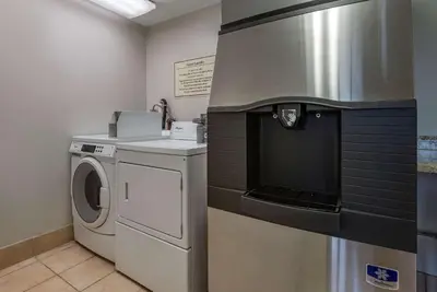 a laundry room with a washer and dryer at MainStay Suites Horsham - Philadelphia in Horsham
