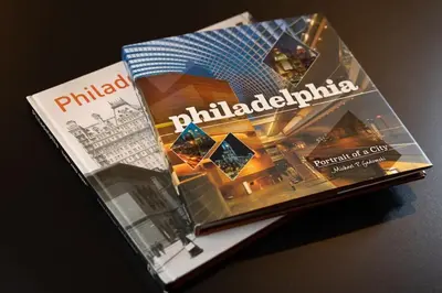 a magazine sitting on top of a table at Thena Hotel - Large Studio in Philadelphia