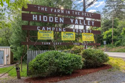a sign for the fair in the bell hidden valley at Cozy Cabin4 Within Campground in Mifflinburg
