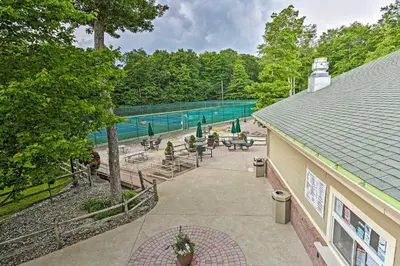 an overhead view of a swimming pool in a park at Lovely Poconos Cabin with Resort Amenities! in Gouldsboro