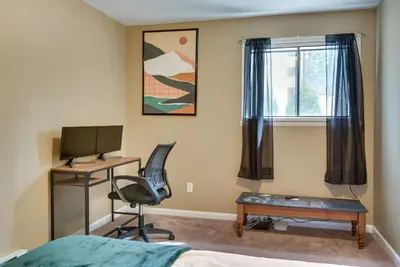a bedroom with a desk and a computer and a chair at Serene Pocono Pines Home 2 Mi to Lake Naomi Beach in Pocono Pines