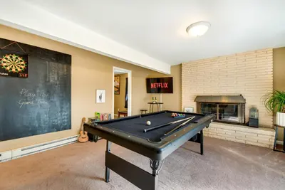 a pool table in a room with a chalkboard at Serene Pocono Pines Home 2 Mi to Lake Naomi Beach in Pocono Pines